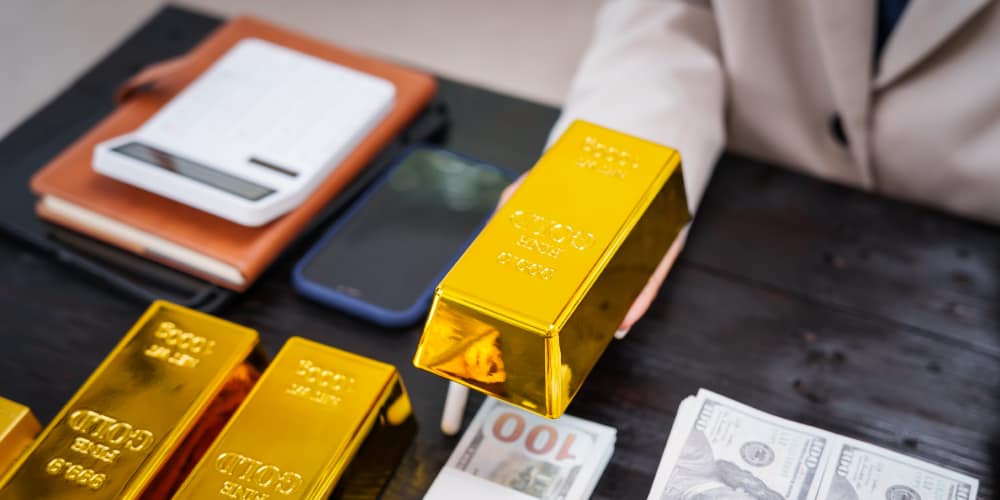 Learn about over spot meaning and how it impacts the gold-buying market with this helpful guide from American Hartford Gold.